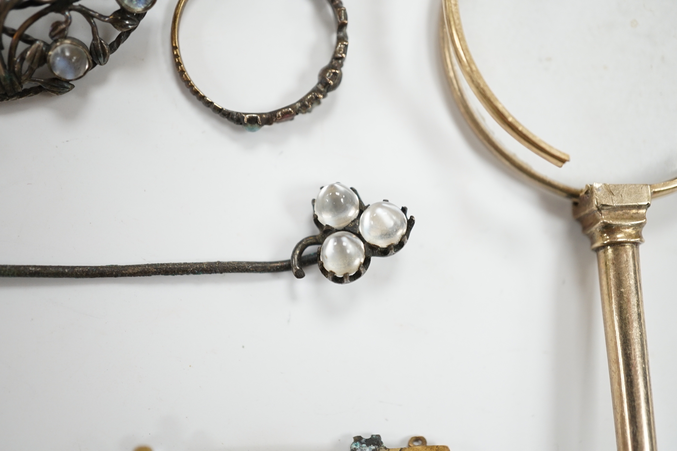 A pair of gold plated lorgnettes (a.f.) and five other items of jewellery including moonstone set (all a.f.).